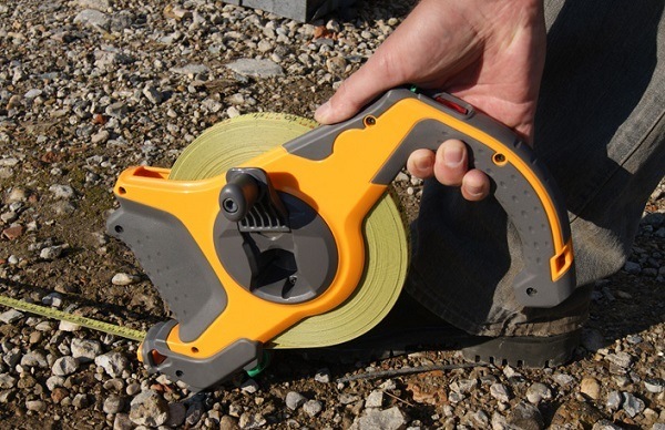 Terrein inmeten met een meetband